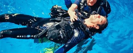 Students taking the PADI Rescue Diver course simulating a real rescue scenario